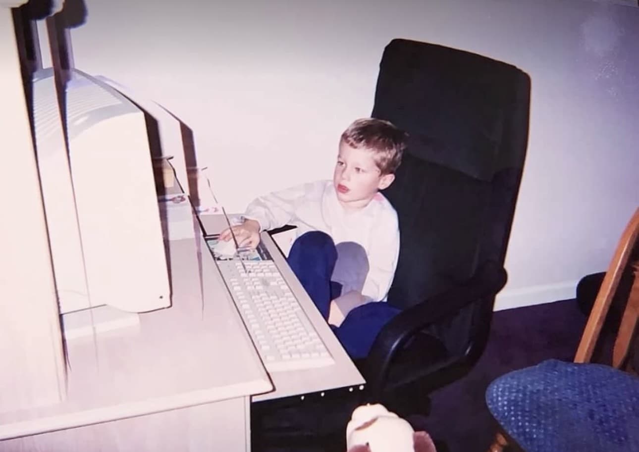 Brian as a kid at the computer